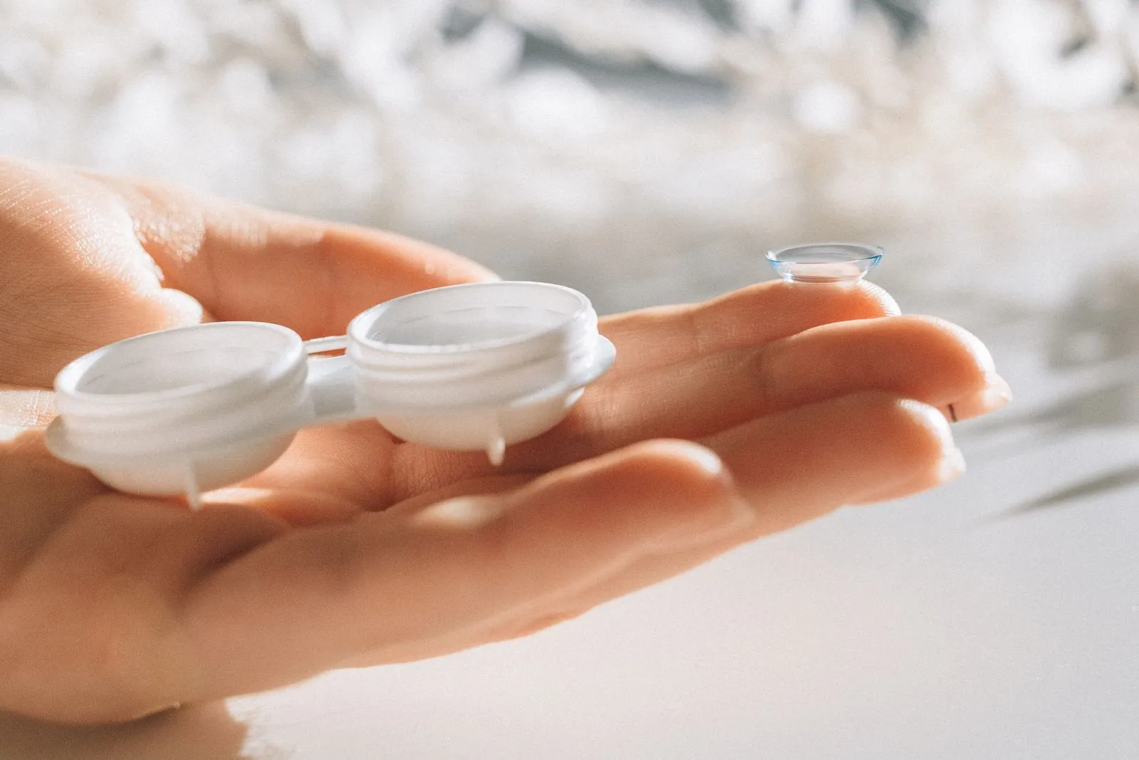 Contact lenses in the palm of a hand