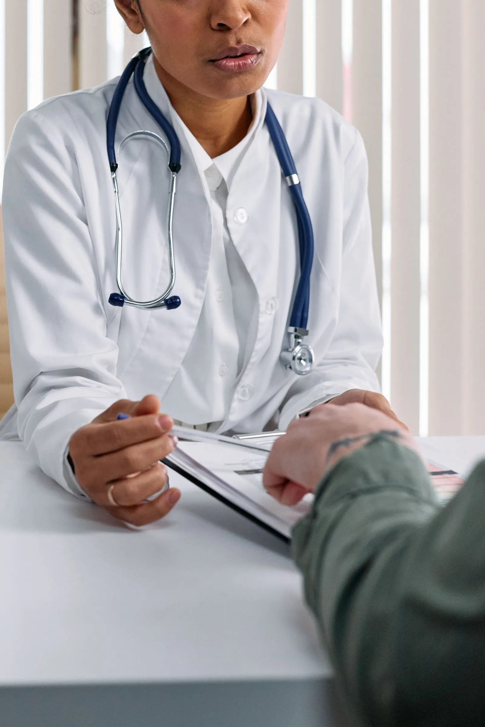 Doctor going over results with a patient in Plant City