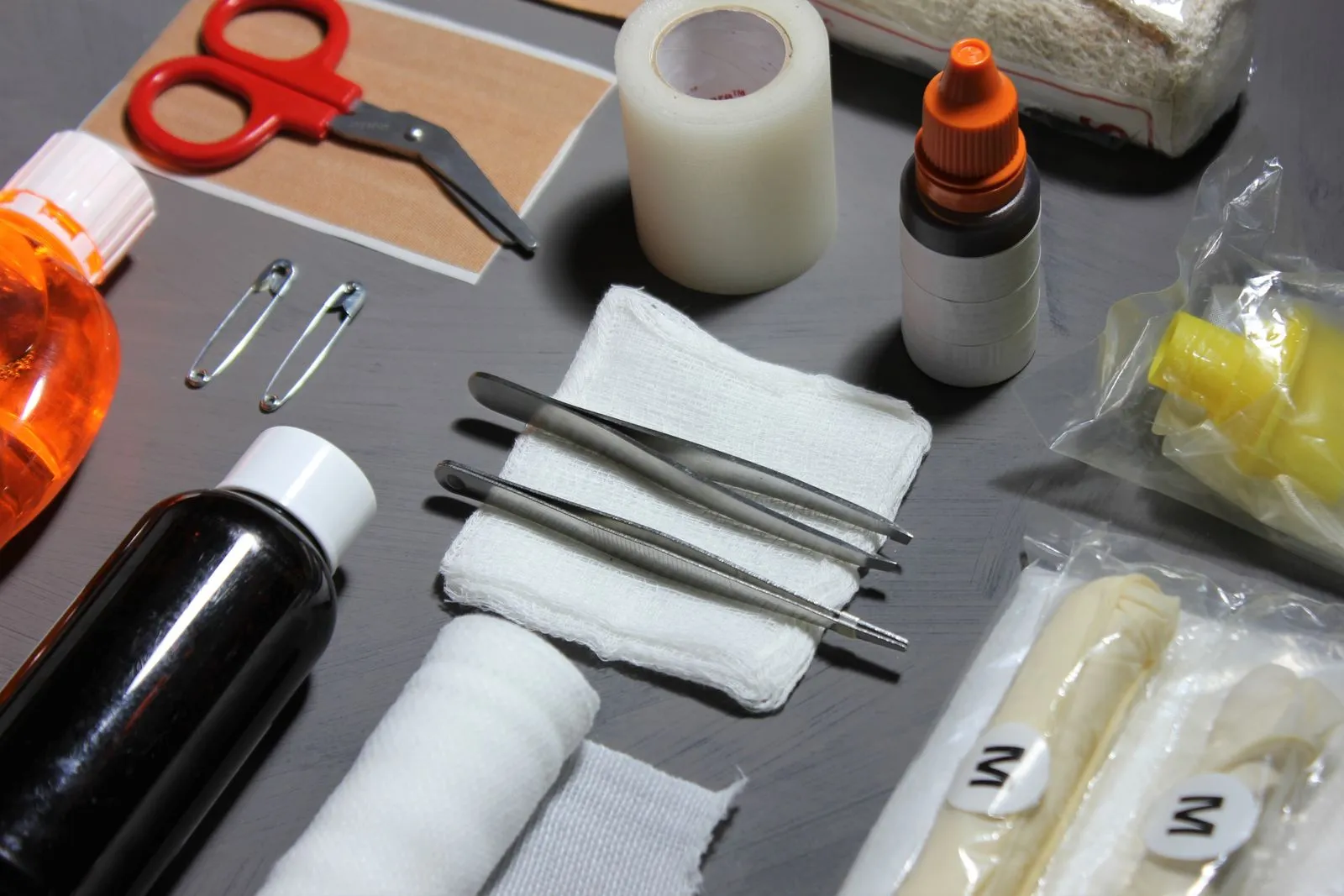 First aid supplies with bandages, gauze and scissors